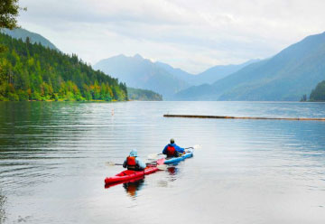 Olympic and Vancouver lake with people kayaking thumbnail